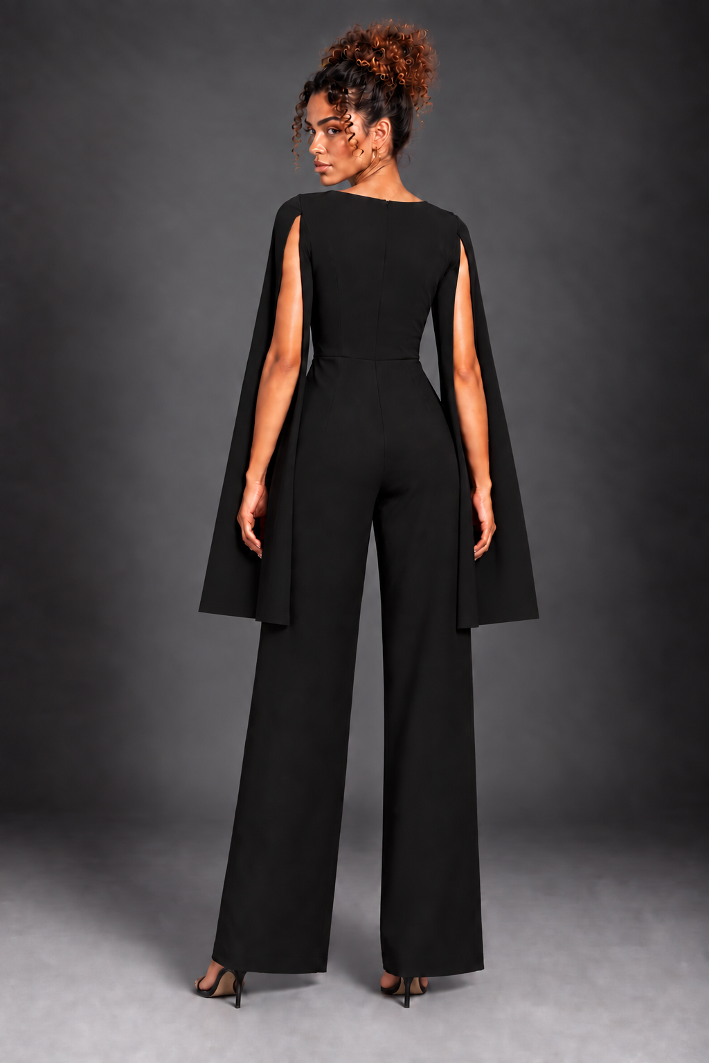 Capella back view on Lisa with straight leg trousers and straight cape hem
