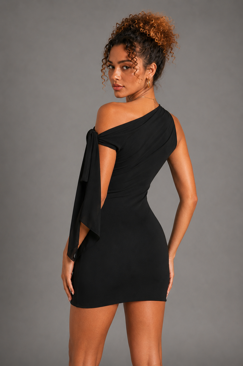 Siren black one-shoulder dress on Lisa - back view